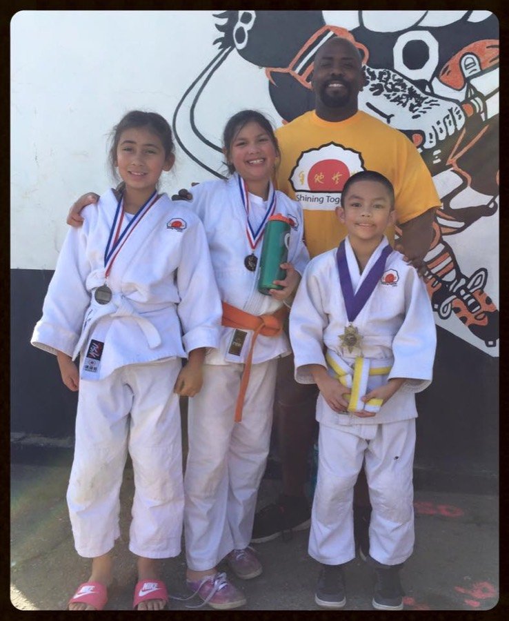Three students with their medals at the Vacaville tournament